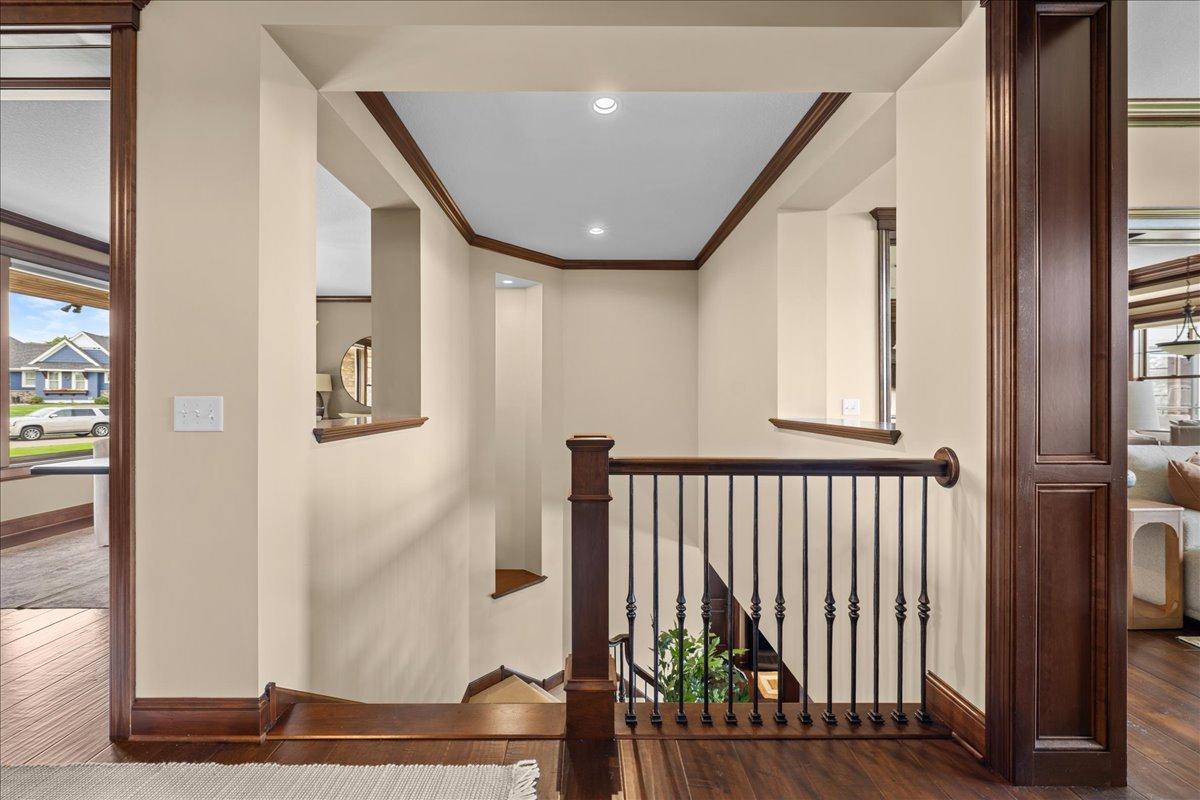Stair well to lower level with a custom niche.