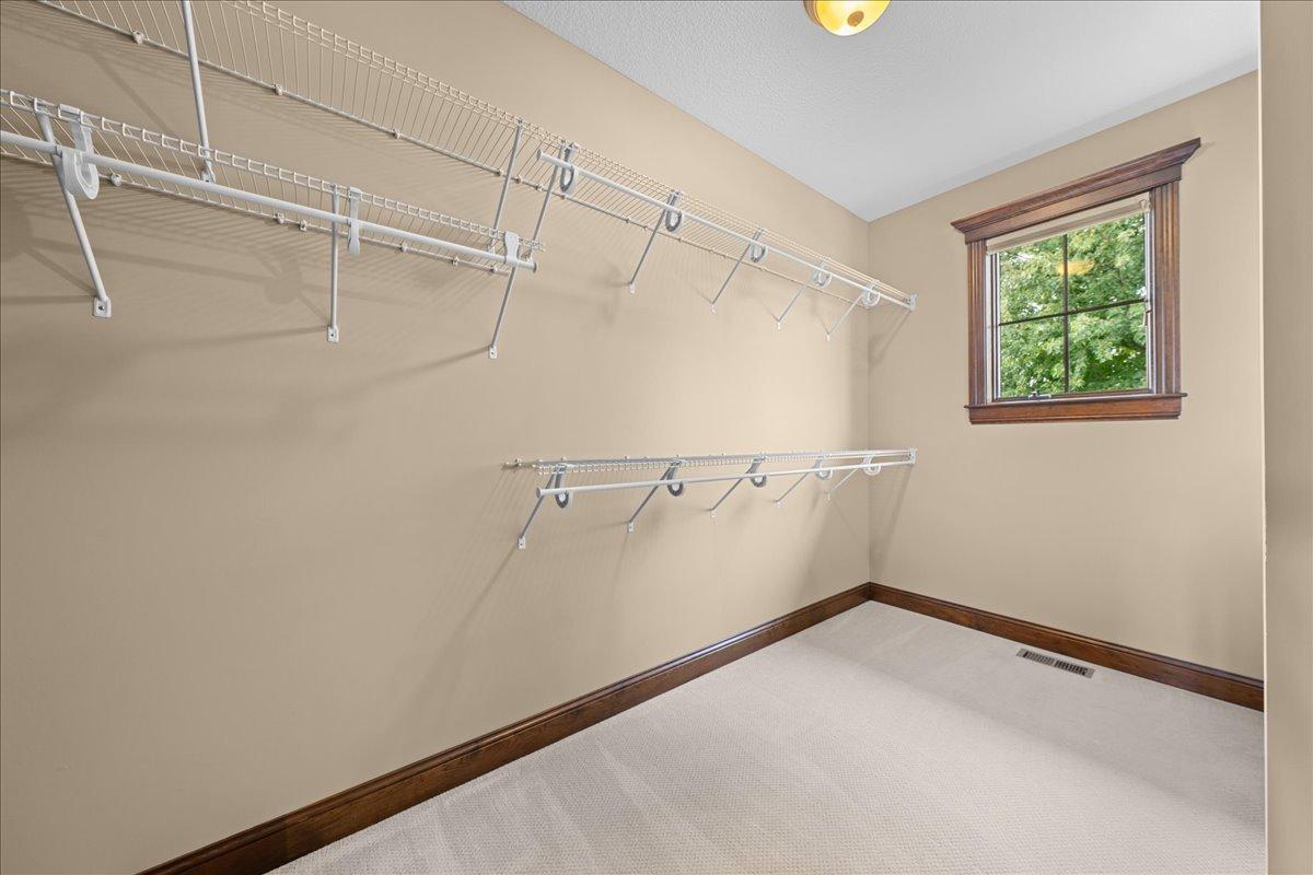 14x9 primary bedroom walk-in-closet.