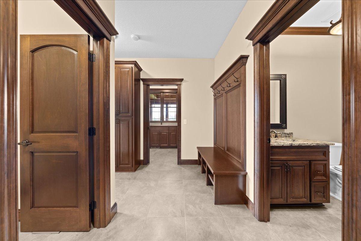 Mud room leading to office, laundry, and garage.