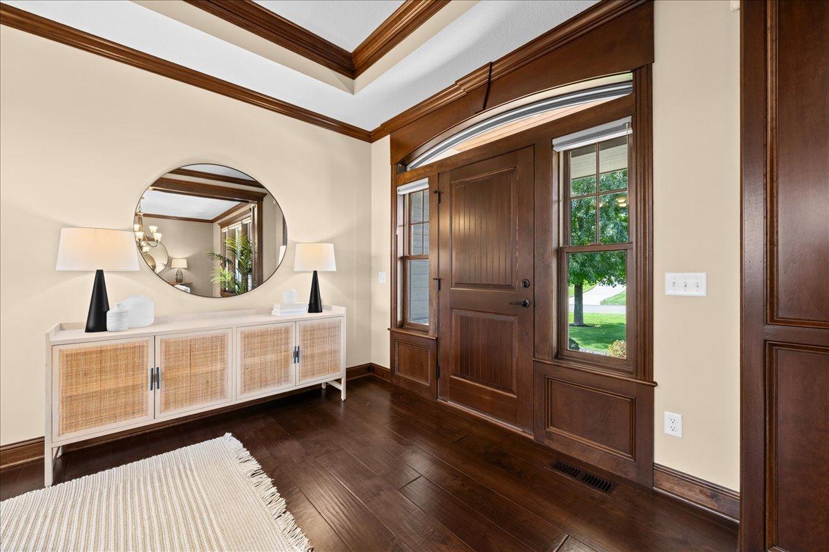 Foyer area with triple crown tray ceiling.