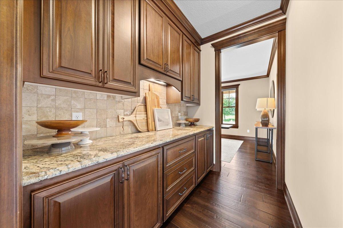 Butler pantry with plenty of storage for your special dinner supplies.