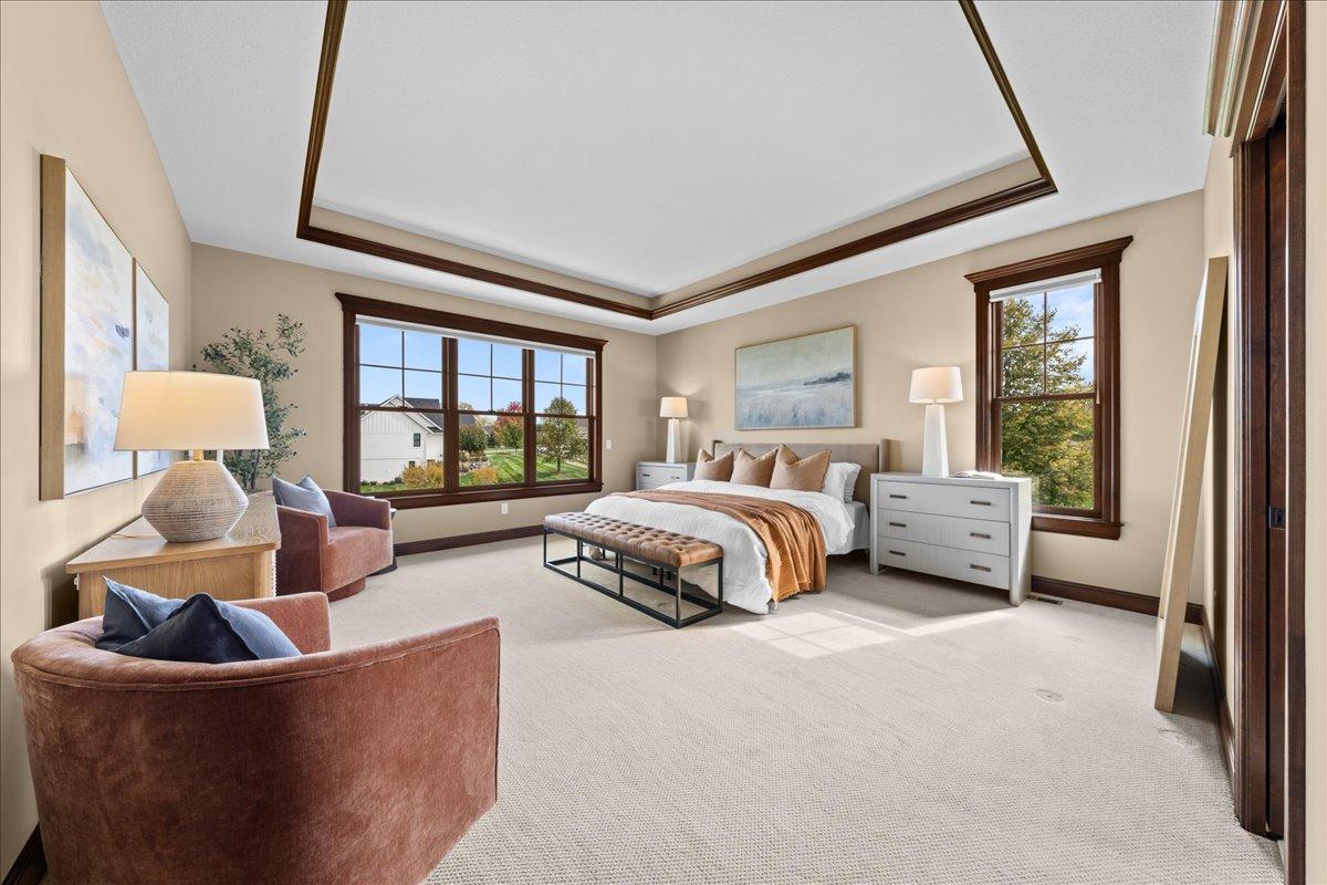 Primary suite with tray ceilings.