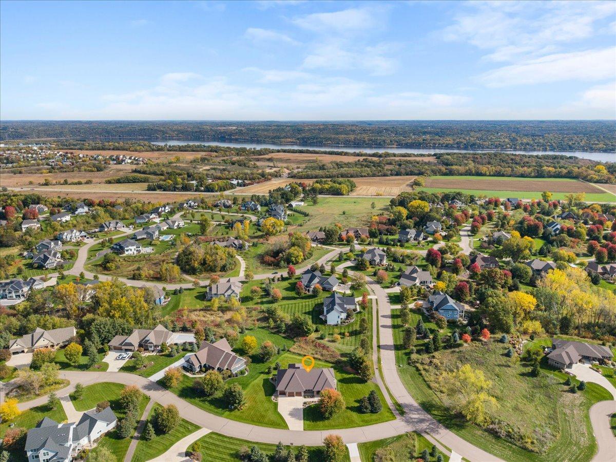 Aerial view of neighborhood. Your home is marked with yellow circle in front center of picture.