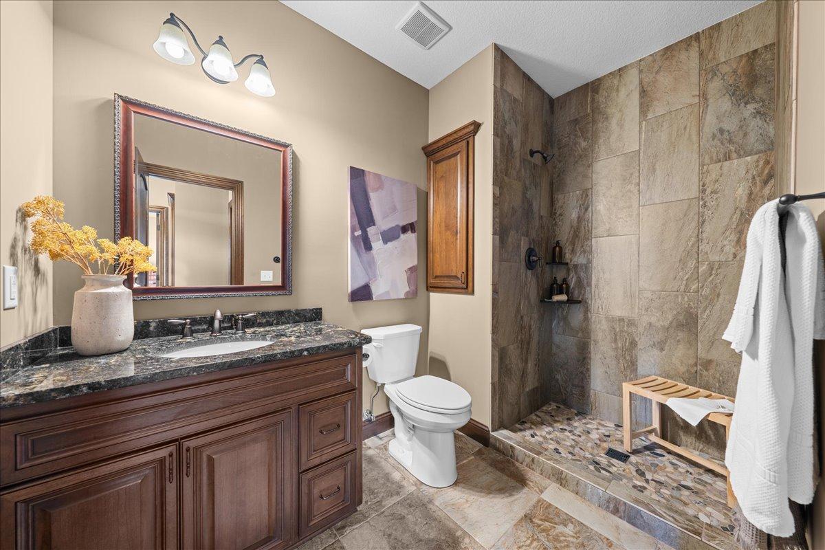 3/4 bath adjacent to lower level mud room.