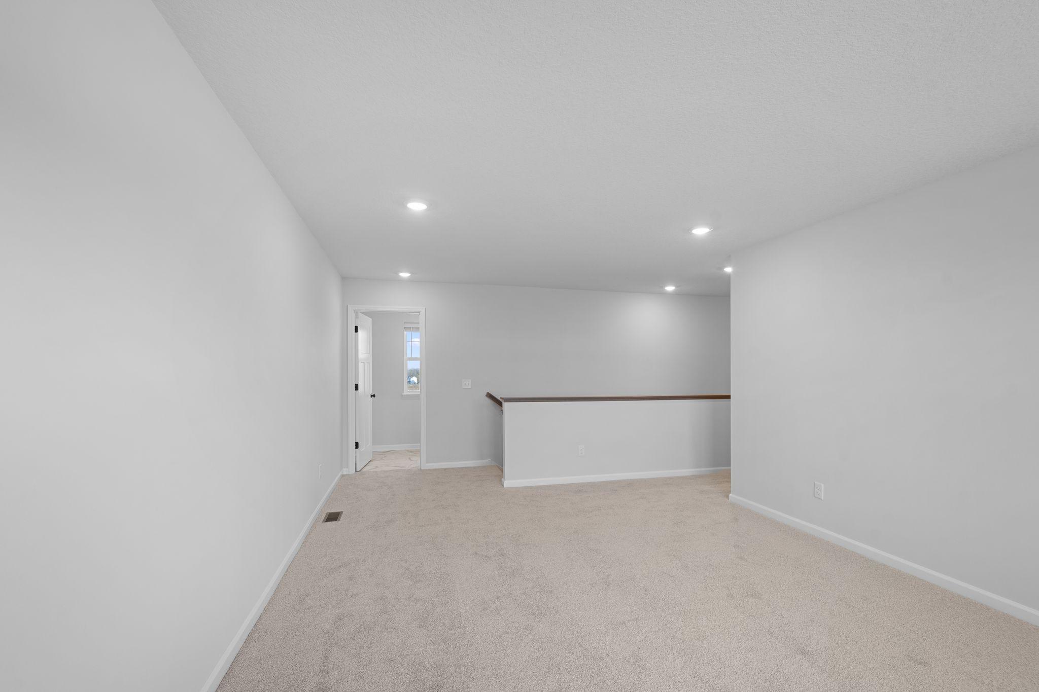 Loft; Photos of a previously built home. Finishes may vary.
