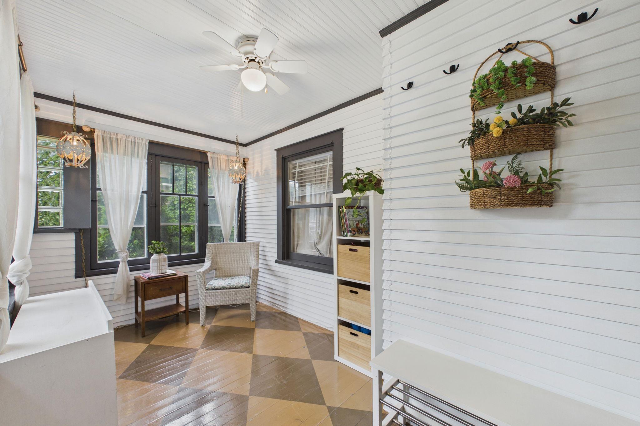 Painted wood floors. This is a great entryway into the home.