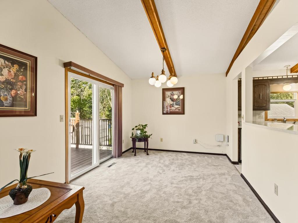 Large breakfast bar to the right in the kitchen could have 3-4 barstools