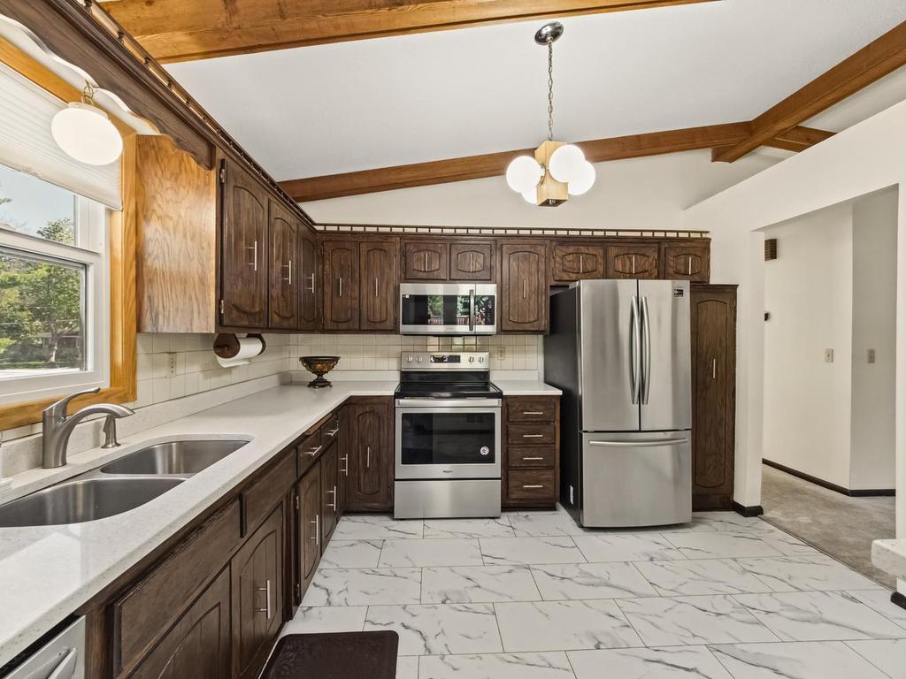 Newer energy efficient stainless kitchen appliances installed 2025