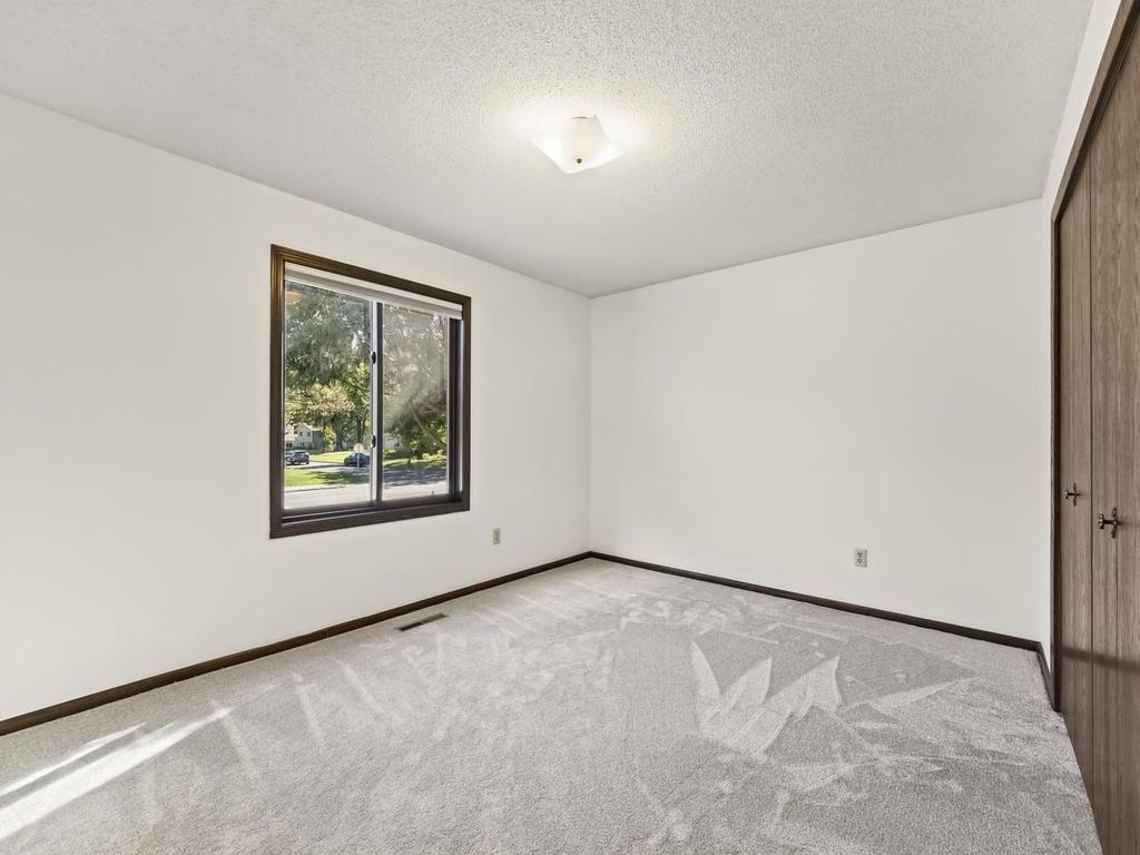 3rd bedroom downstairs with new Anderson window 2022.. New carpet installed last year 2022.