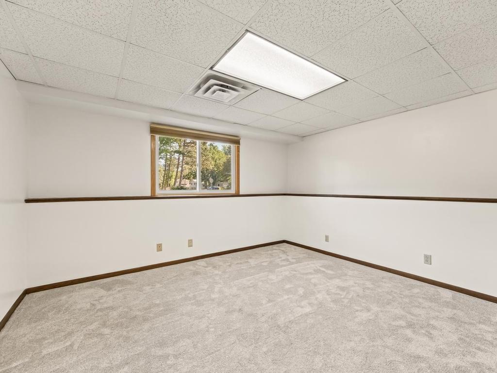 5th bedroom in lower level with New Anderson window. New carpet installed last year 2022.