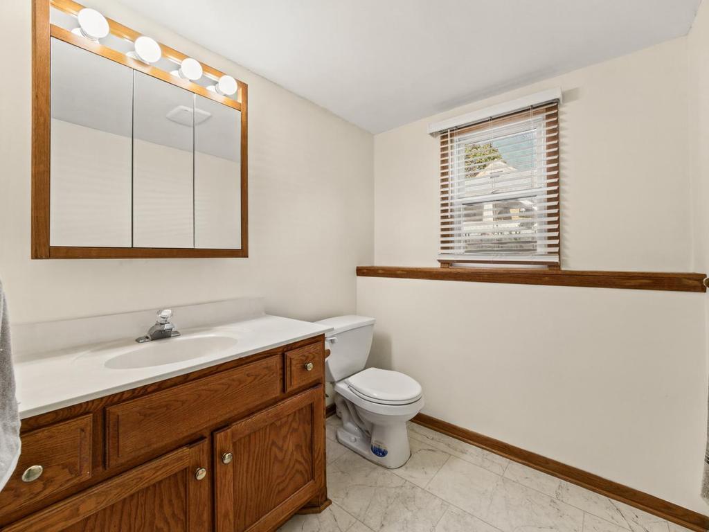 Updated lower level 3/4 bathroom with walk-in shower completed in 2022 with New Anderson window!