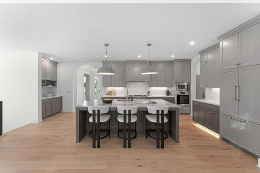 Kitchen with Center Island Seating - Not Actual Home, Photos of Model with the Same Layout