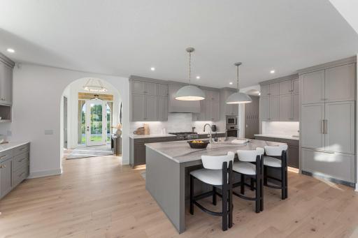 Kitchen Island and Paneled Refrigerator - Not Actual Home, Photos of Model with the Same Layout