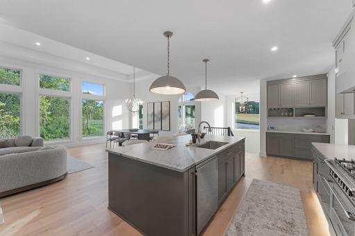 Waterfall Quartz Island with Pendant Lighting - Not Actual Home, Photos of Model with the Same Layout