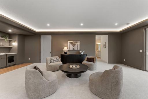Lower Level Lounge Area - Not Actual Home, Photos of Model with the Same Layout