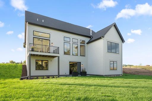 Rear Exterior with Walkout and Balcony - Not Actual Home, Photos of Model with the Same Layout