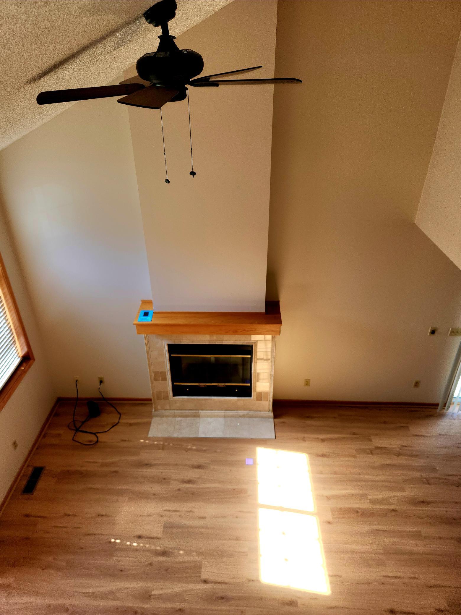 View of staged living room from loft