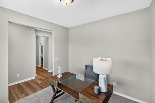 PHOTO OF A DIFFERENT HOME WITH SIMILAR PLAN AND FINISHES.