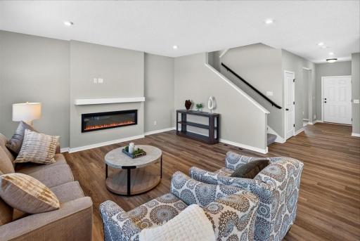 PHOTO OF A DIFFERENT HOME WITH SIMILAR PLAN AND FINISHES.