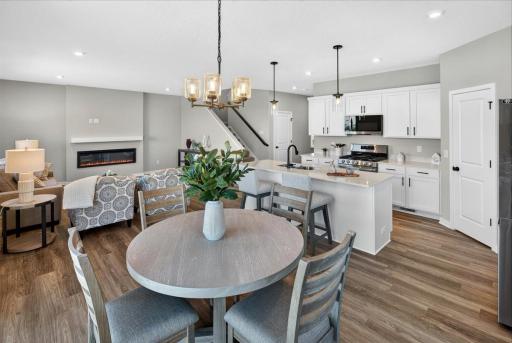 PHOTO OF A DIFFERENT HOME WITH SIMILAR PLAN AND FINISHES.