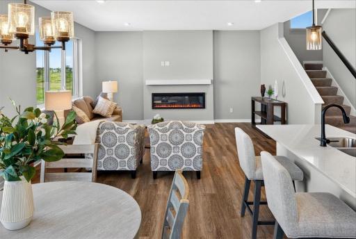 PHOTO OF A DIFFERENT HOME WITH SIMILAR PLAN AND FINISHES.