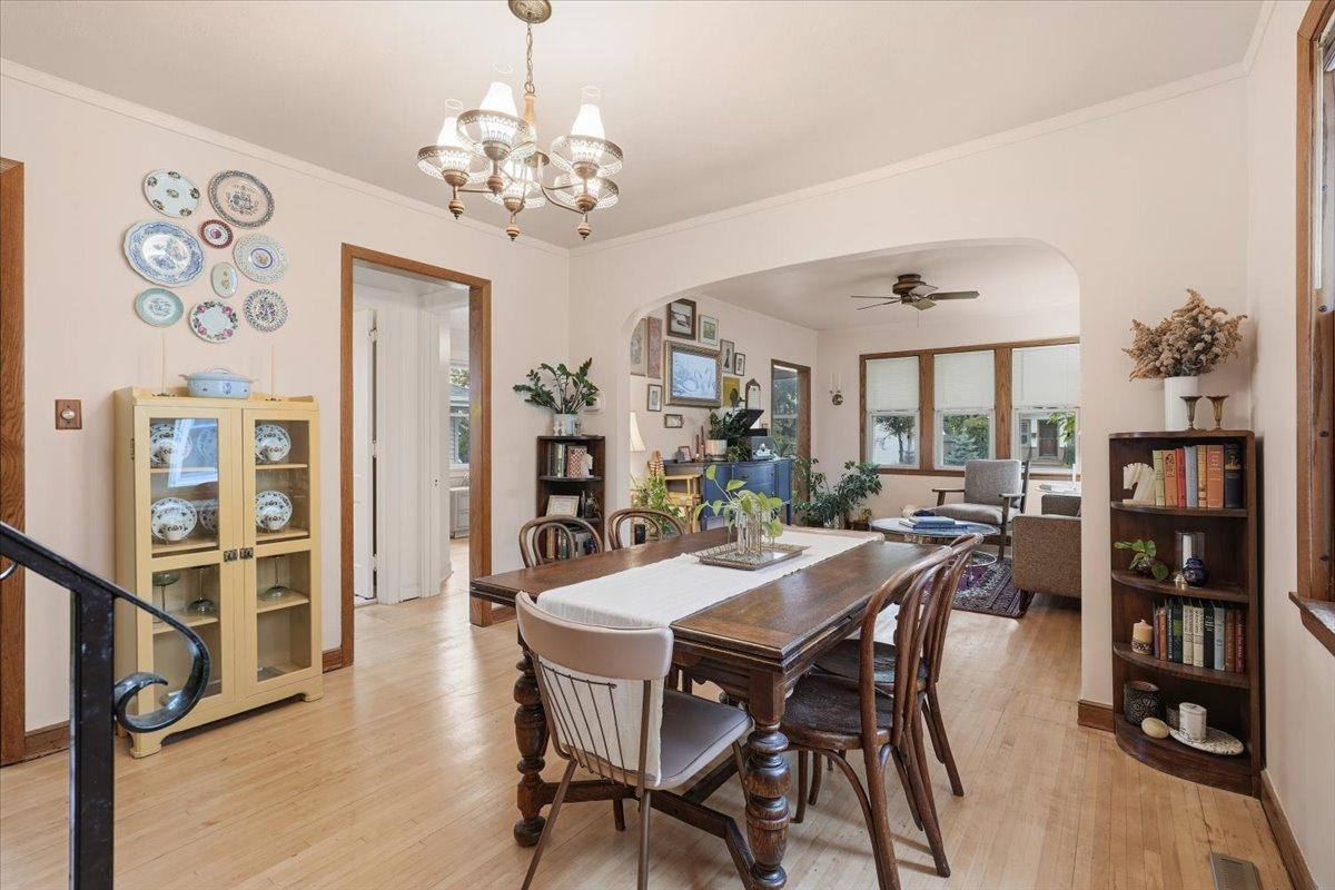 Original woodwork, refinished hardwood floors and an arched opening between rooms bring warmth and character to the main level.