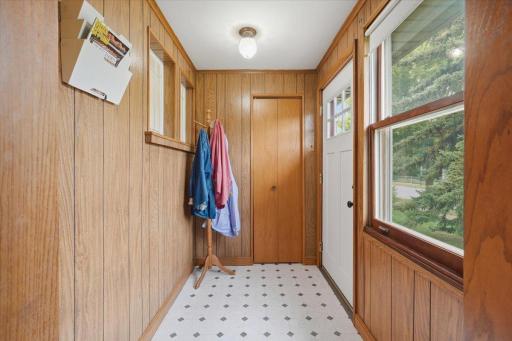 Kick off your shoes, hang up your coat and come on in. This enclosed front entry creates a practical landing spot before stepping into the main living space.