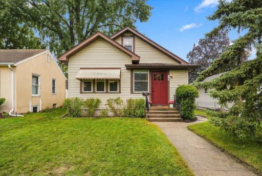 A warm welcome to Morris Park, complete with an inviting new front door (2026) and classic South Minneapolis character.
