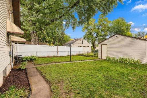 Your own slice of the city: a fully fenced backyard with established garden beds, green space and room to enjoy the outdoors.