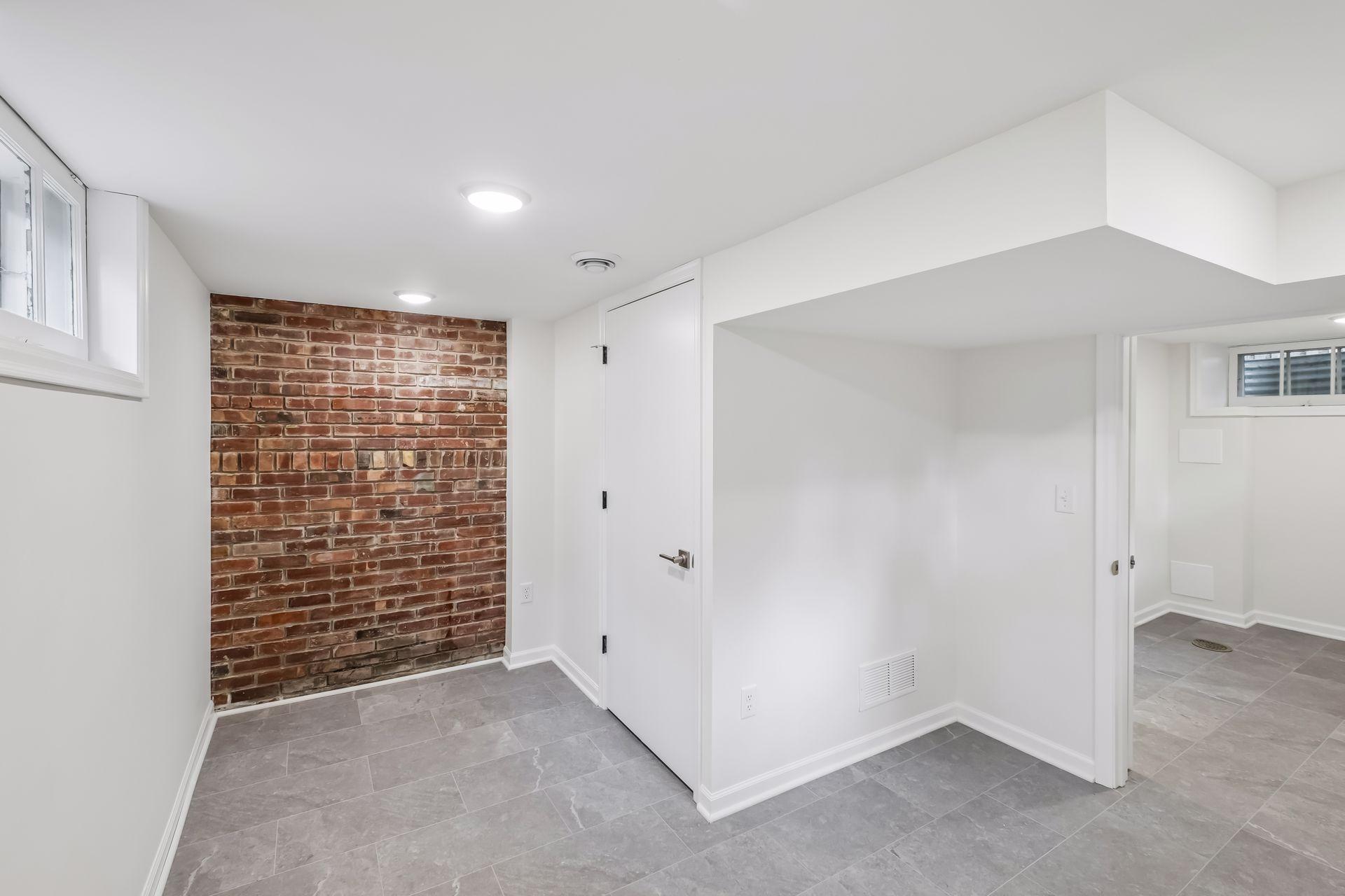 Bonus room has a wall of brick adds character perhaps an industrial style office. Lots of privacy large enough for most any use.