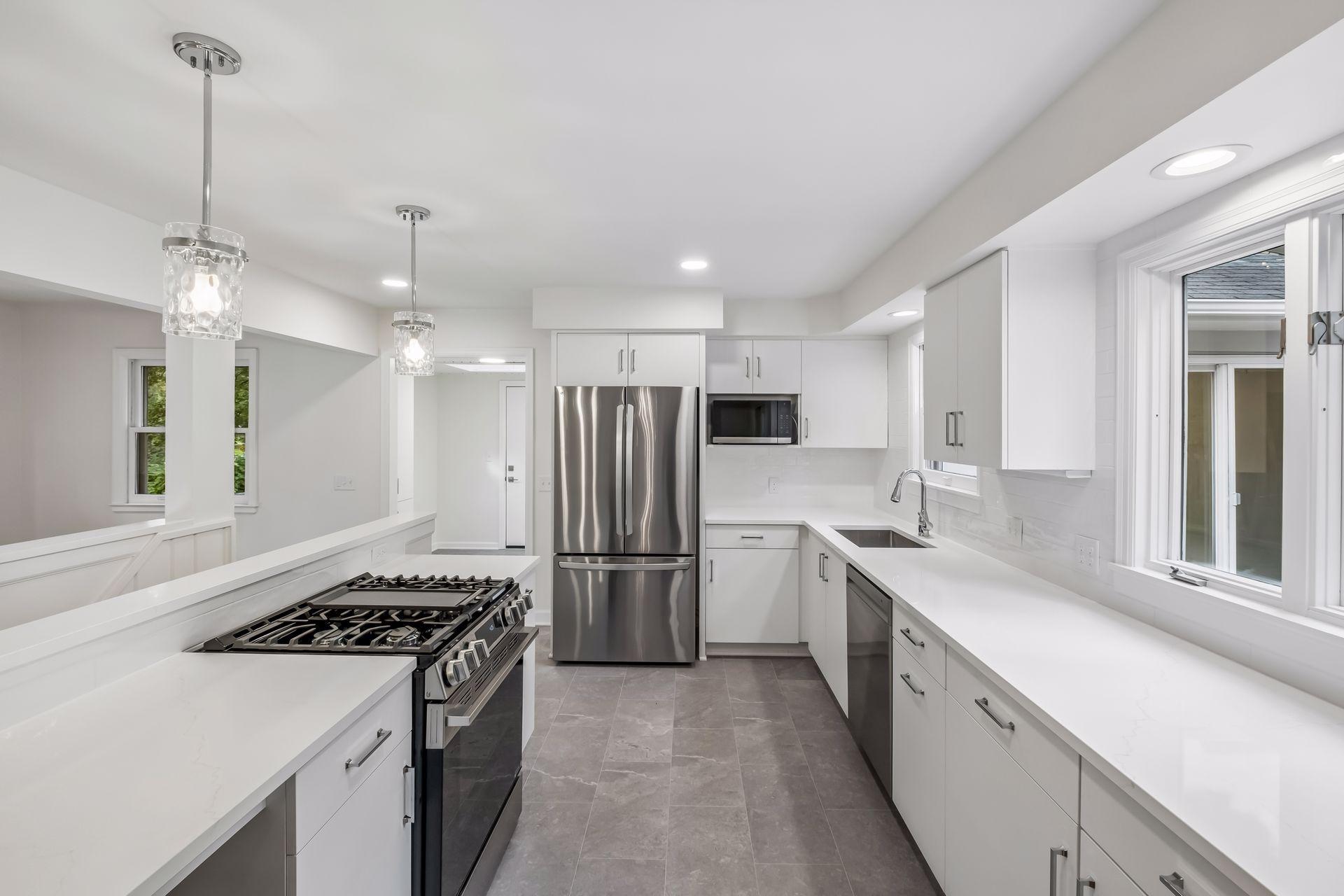 New lighting, sink, custom cabintry, flooring and more.
