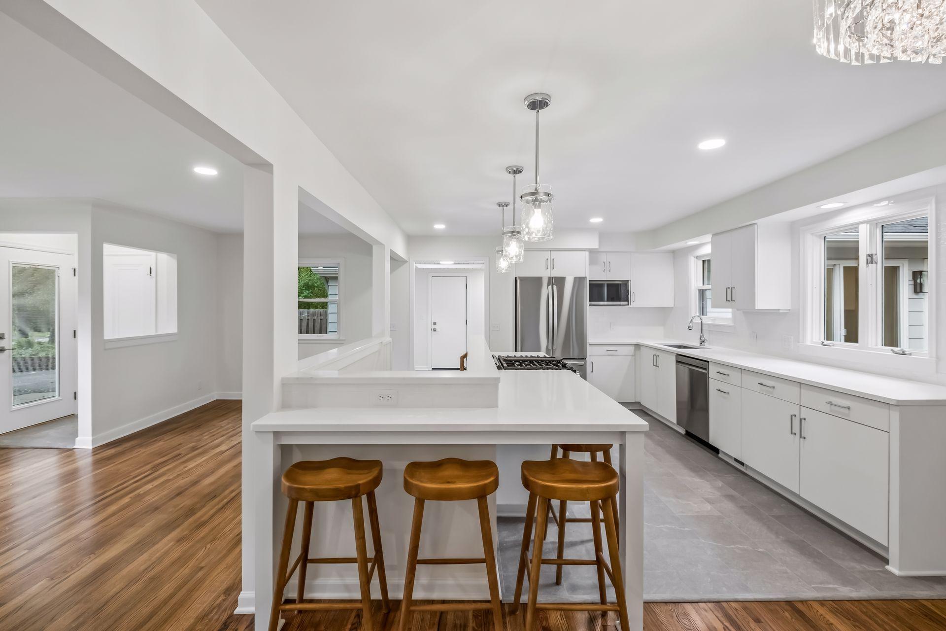 original Wood floors sanded, stained and sealed on main level and 2 of 3 bedrooms.