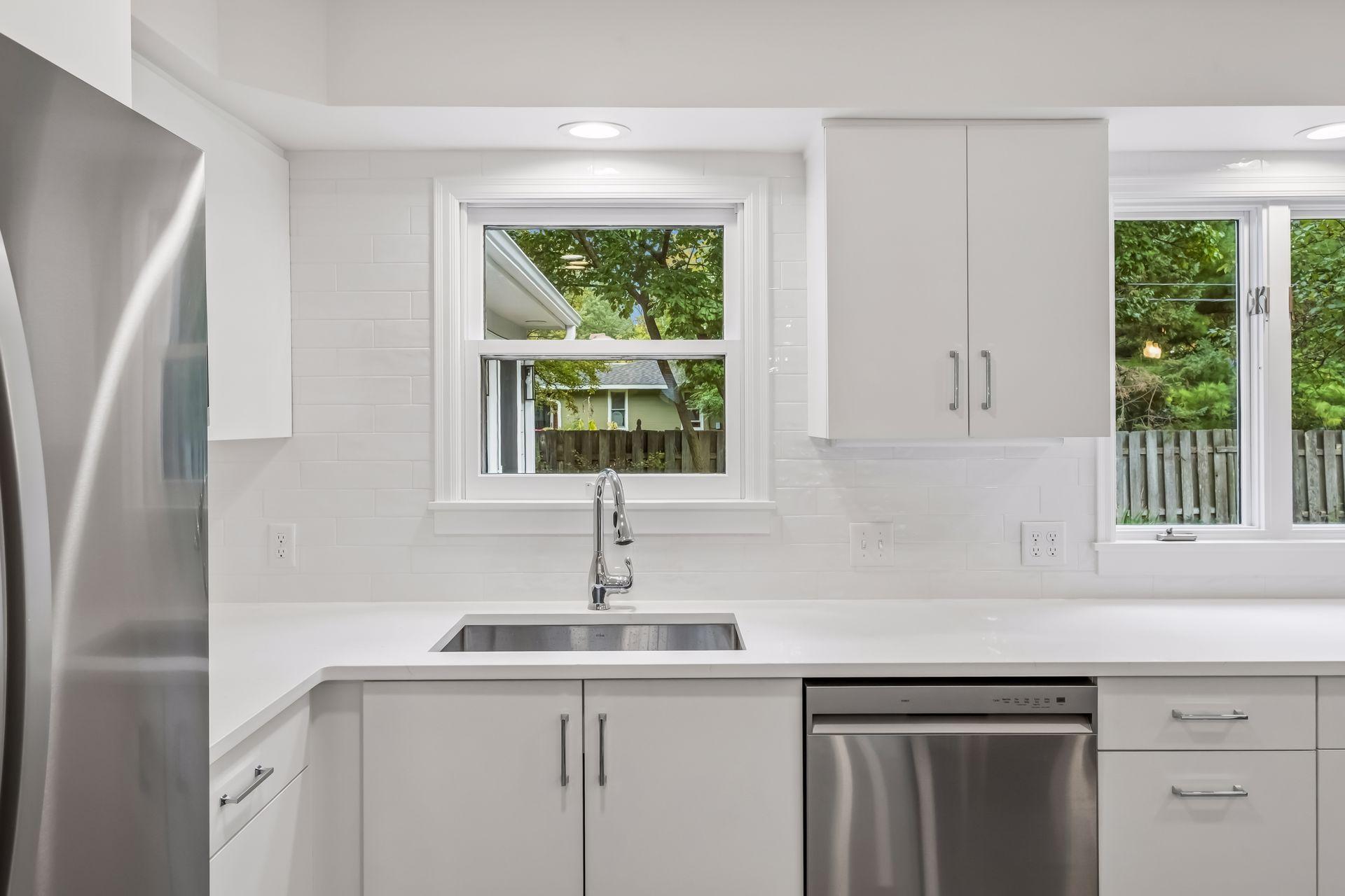 tons of natural sunlight thru several windows w views of the backyard patio and beautiful yard.