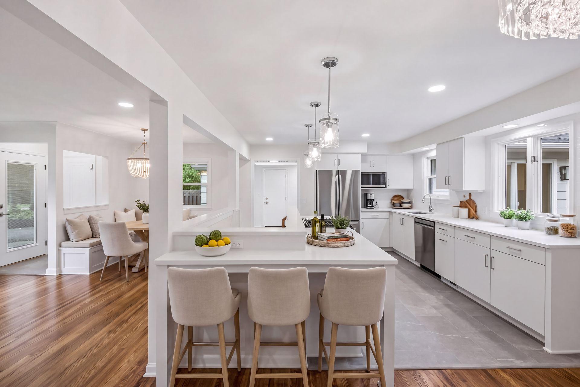 This photo is virtually staged. New Kitchen has pull up seating for 4, and informal seating. This photo is virtually staged.