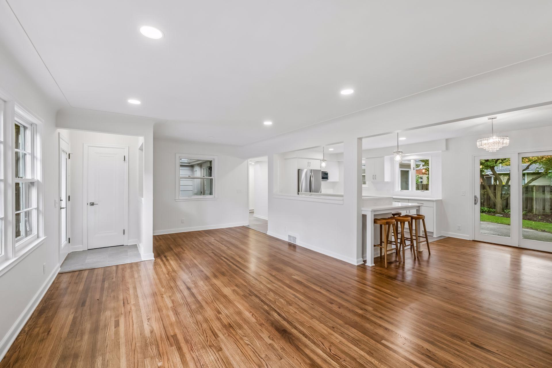 Front Entry area was opened by cutting out the wall to see through to the kitchen and family room upon entry. Nice closet door upon arrival.