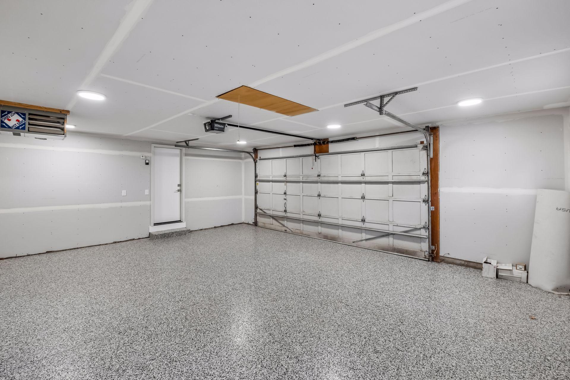 New garage door opener, double stall plus additional space on side of garage for storage