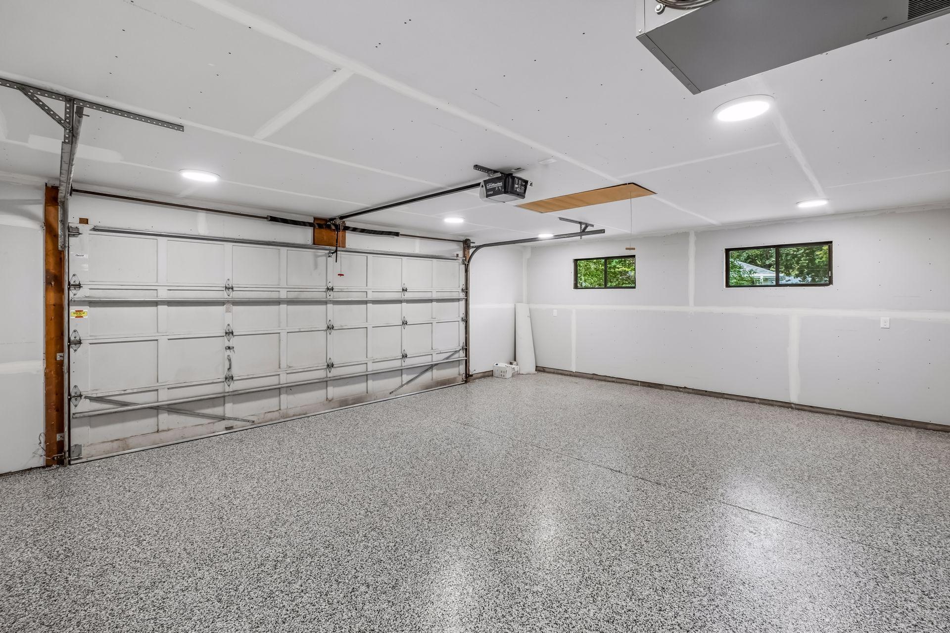 New epoxy flooring in garage. Heater, and New lights