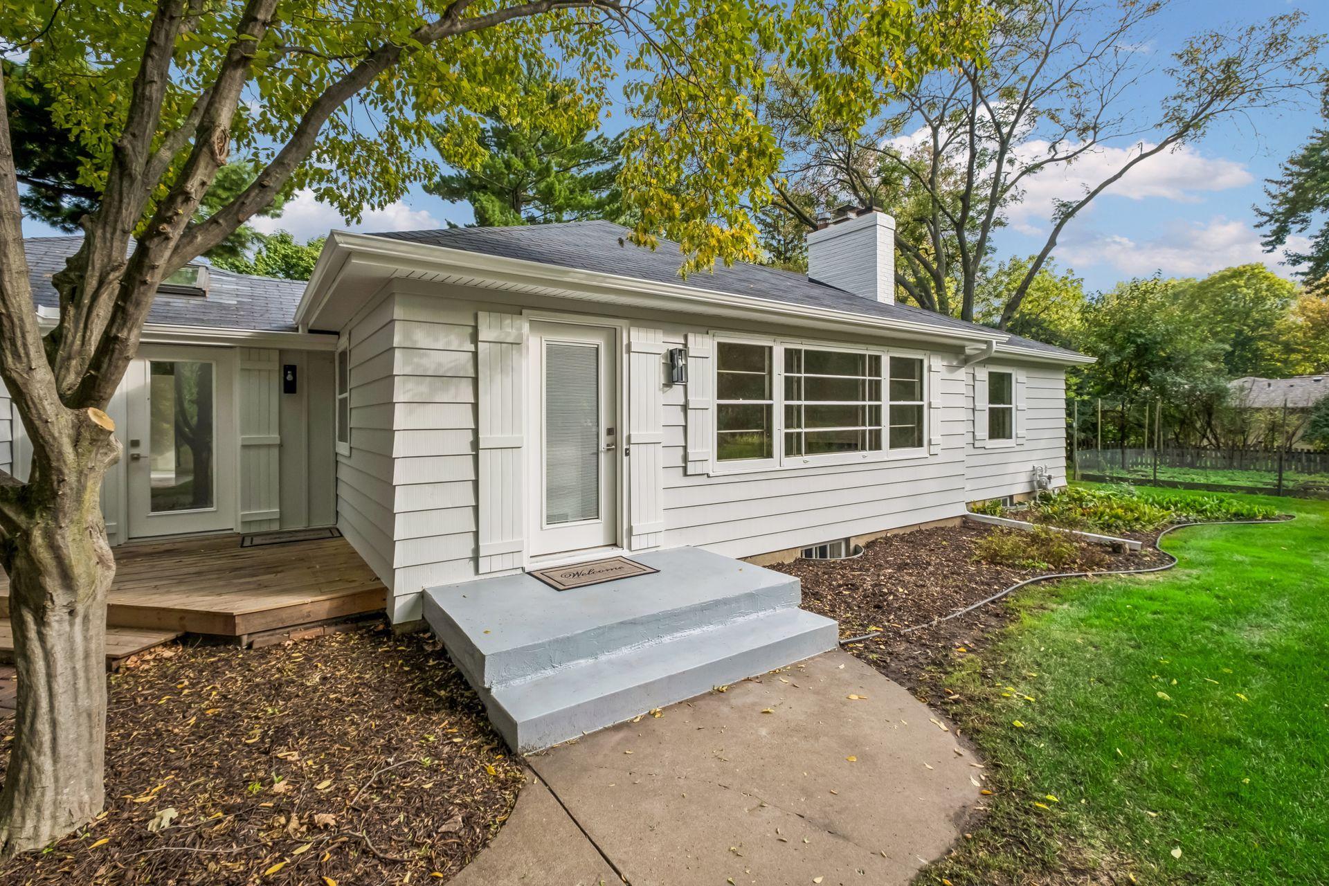 Newly added square footage to home, with new main level primary and lower level office and storage area. Two Front Entries for convenience. Side entry leads straight into the Mud Room area.