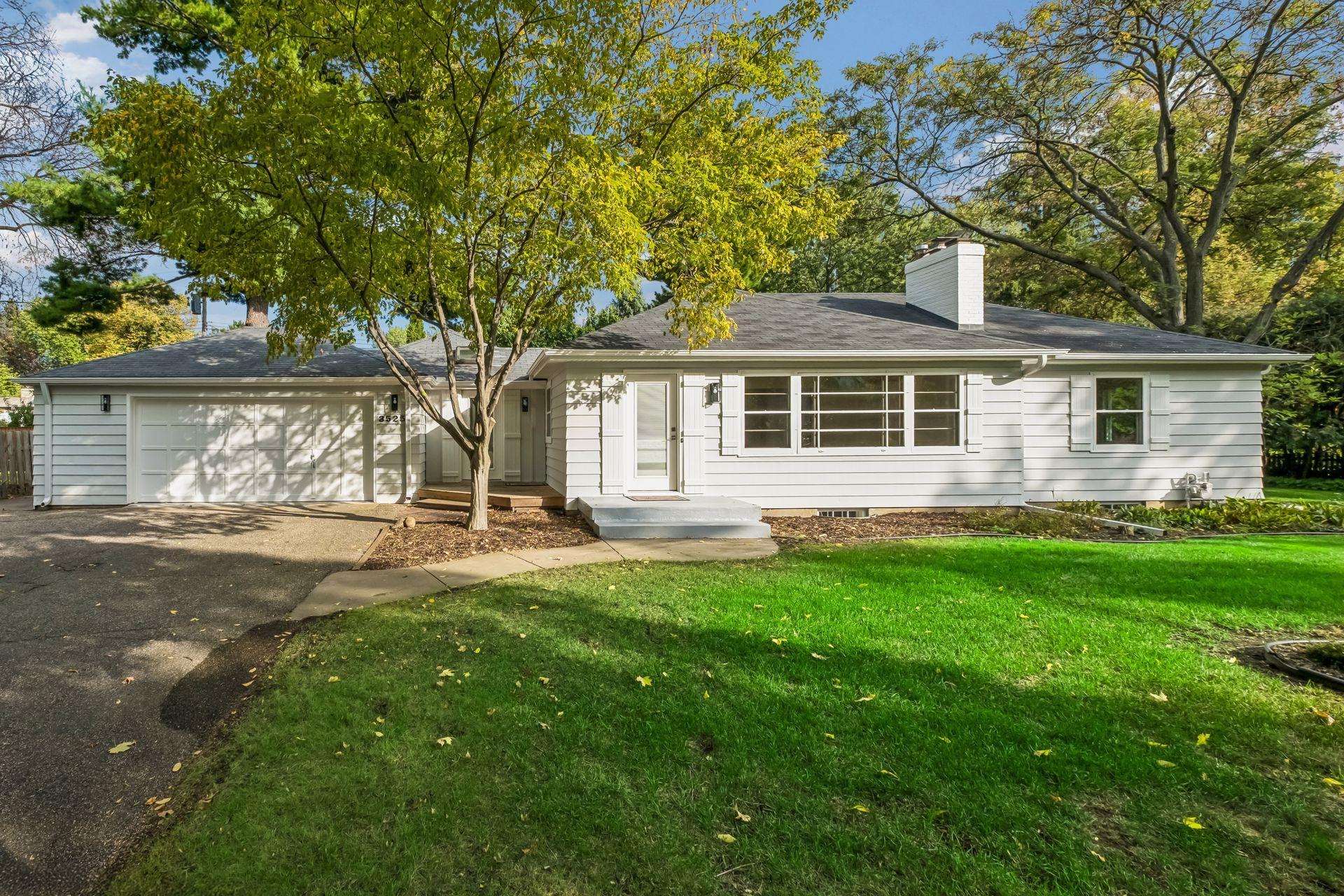 Fully Remodeled California Rambler w Wayzata location assigned to award winning Minnetonka School District, on just under 1/2 acre