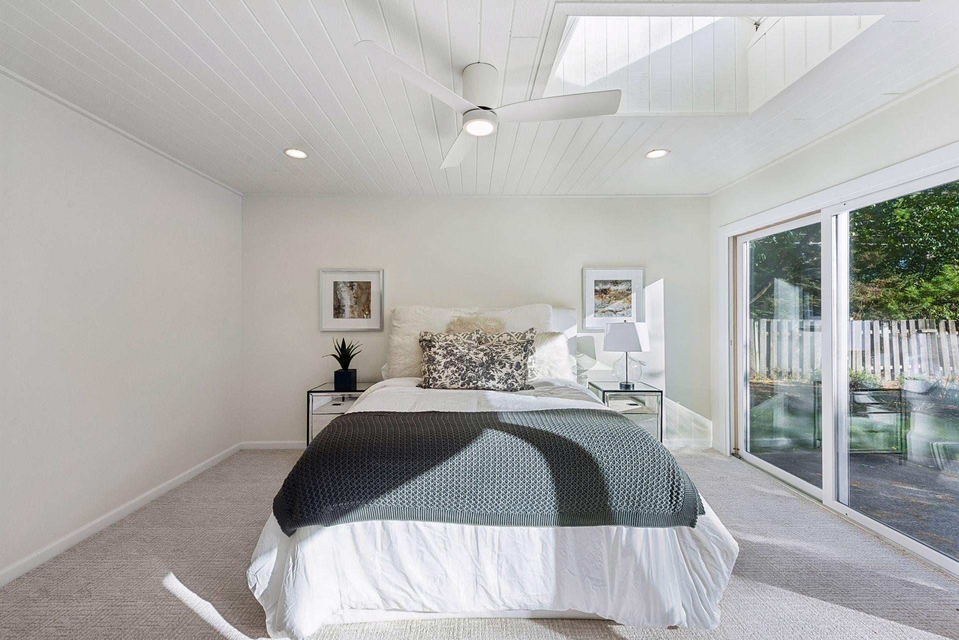Large Primary Bedroom with access to deck and en suite bathroom!