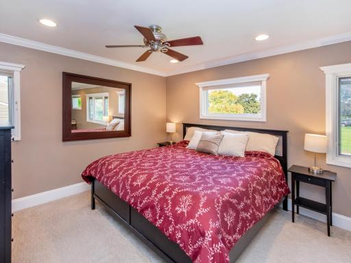 Primary bedroom with ensuite and two closets - including a large walk-in.