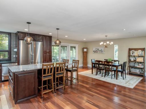Perfect for entertaining, the kitchen and dining room flow seamlessly together to create a warm and connected gathering space.