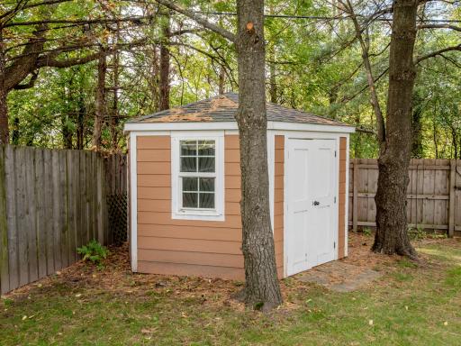 A bonus storage shed provides the perfect space for outdoor toys, equipment and seasonal essentials.