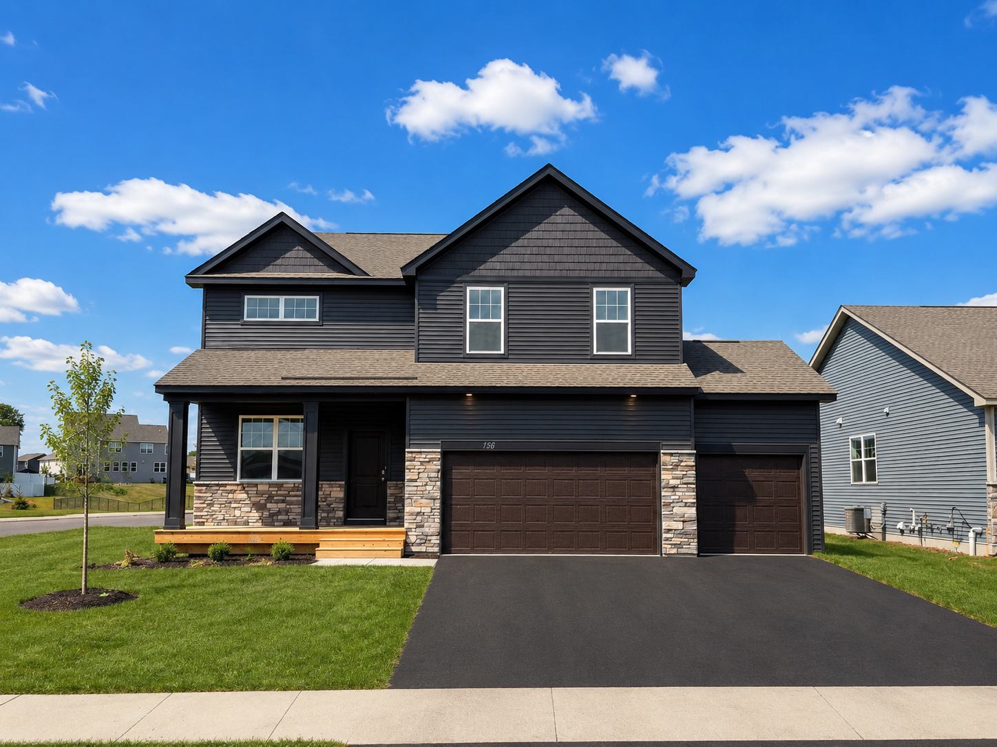 Welcome to The Hudson, a 4 bedroom, 3 bathroom home in The Fields of Waconia. *Photo is virtually staged. Landscaping and trees will vary. Sod is not laid yet, but is included.
