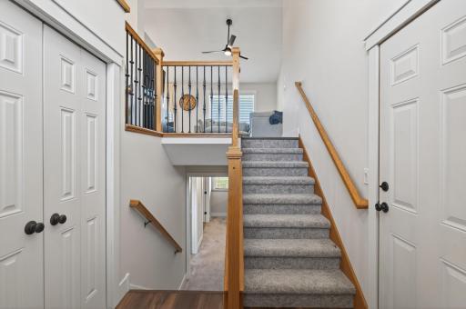 View of the upper level from the foyer. Coat closet and a perfect niche to add a built-in bench