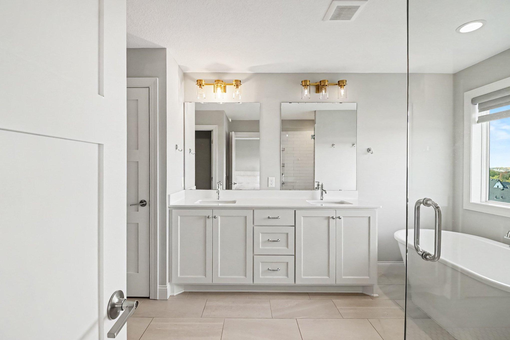 Large, light-filled primary bathroom