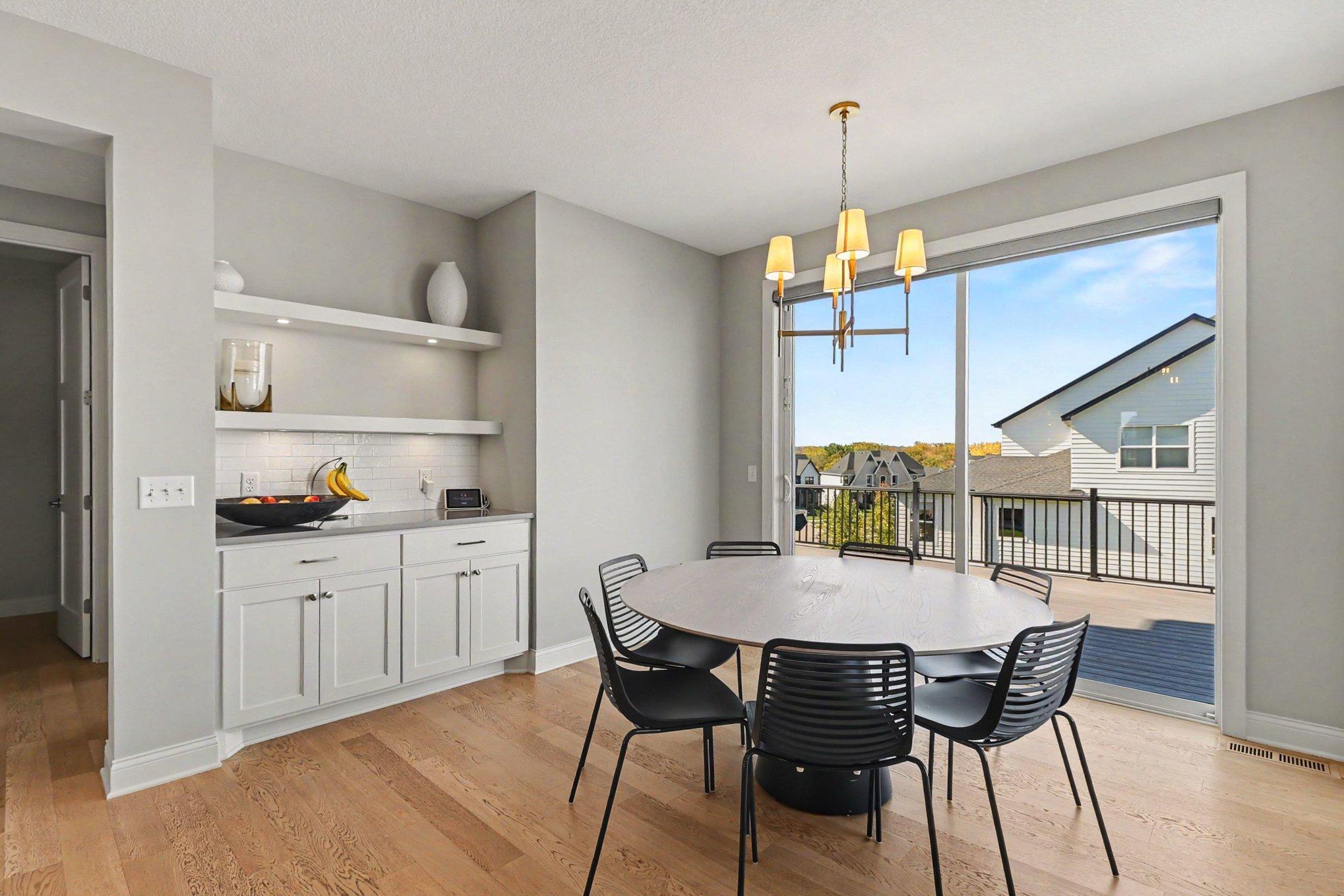 A west-facing eat-in kitchen that walks out to a massive 52-foot-long, maintenance-free deck.