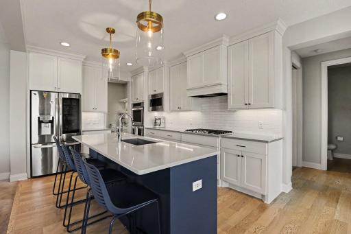 Elegant Chef's kitchen with top-tier appliances.