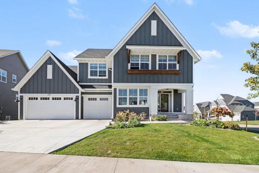 Exceptional Stonegate west-facing 6-bed, 5-bath two-story walkout within steps of the community pool, playground, and clubhouse.
