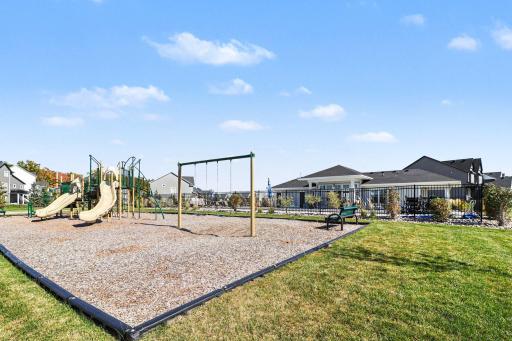 The neighborhood playground can be seen from the deck and patio.